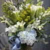 introducing Our New Design Blue Hue, beautifully arranged with lilies, hydrangea, delphinium