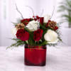 Celebrate the season with our Winter Red &amp; White Rose Arrangement, featuring
