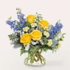 Nothing says spring like a yellow rose bouquet. This bright creation will