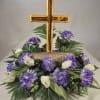 Celebrate the hope and renewal of Easter with this artificial floral centerpiece
