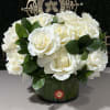 Premium rose low arrangement in leaf lined vase, perfect for centerpiece or