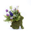 This adorable moss covered bunny is filled with artificial spring flowers. You