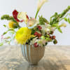 Bright and Yellow!
Gorgeous mums, lillies and pincushions are arranged with anthuriums, orchids