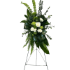 Tall standing floral spray with white roses and green foliage on an easel