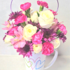 Lots of love, miniature roses and long lasting flowers in a tall