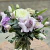 An elegant collection of soft hues of lavender, lilacs and white blossoms