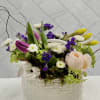 This adorable basket has the freshest blooms! Green hydrangea, garden rose, tulips