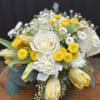 Yellow and white hues collection featuring tulips, roses amongst other blossoms.