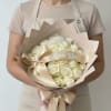 An elegant expression of timeless love. This luxurious bouquet features premium ivory
