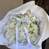 A serene and elegant all-white bouquet, Morning Sky features a delicate mix
