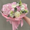 A charming and elegant bouquet, Sweet Unique features soft pink hydrangeas, a