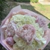 A romantic and luxurious bouquet, Vanilla Petal Kiss combines soft pink peonies