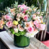 Beautiful bouquet of mixed spring pallet features blush pink and light green