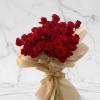 A stunning bouquet of 35 red roses arranged in a full elegant