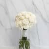 Graceful, timeless, and beautifully refined, this elegant bridesmaid bouquet features fresh white