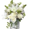 square glass vase
foliage: green
4 white snap dragons
6 white roses
1 stem white Asiatic