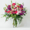 A pink flower arrangement for a special person would typically feature a