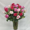 Select this long stemmed two dozen arrangement featuring mixed pink roses, greenery