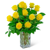 Yellow roses arranged in a clear glass vase
