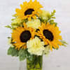 Select this sunny mason jar of sunflowers and carnations! 