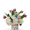 Celebrate spring with this cheerful mix of white hydrangeas, pink tulips, and