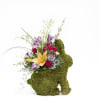 Celebrate the charm of spring with this delightful fresh floral arrangement designed