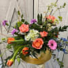 A modern twist to the traditional Easter arrangement. Spring Willow is designed
