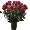three dozen red roses in crystal elegant vase