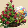 two dozen red roses with chocolate and balloon in a basket