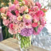 Vibrant and soft color pallet combination with assortment of blooms in tall