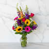 Color any occasion beautiful with this lovely jewel tone bouquet of sunflowers