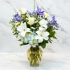 In this Beautiful in Blue flower arrangement, the serenity of this color