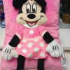 Minnie Mouse plush pillow in pink with white polka dots