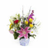 Spring Sonata is a joyful medley of fresh seasonal blooms designed to