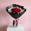 Make a bold and timeless statement with our Midnight Elegance Rose Bouquet