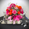 List price is for fresh flowers. Silver bunnies pictured are $33.95, tray