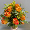 Bouquet of orange roses with yellow filler flowers