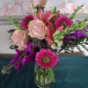 Bouquet of hot pink gerbers, pink lily, pink roses, purple stock