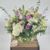 Impress with this modern floral masterpiece&mdash;roses, hydrangea, white stock, and pink lisianthus