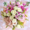 Sweet Spring is a pink kissed arrangement filled with the seasons blooms