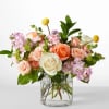 Serene and fragrant, this arrangement blends soft pastels to create a gift