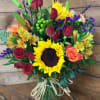 Inspired by the charm of the European countryside, this vibrant arrangement celebrates