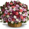Basket of pink, purple, and white mixed flowers