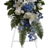 Tranquil blue and white flowers reminiscent of a soft ocean breeze offer
