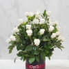 An elegnat and timeless floral arrangement designed to bring softness and sophistication