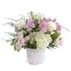 Blush Garden is a soft and romantic arrangement designed with a delicate