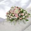 Casket Spray with white Hydrangea offers a serene and dignified farewell. Pink