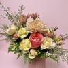 This enchanting Valentine's Day arrangement is a beautiful blend of soft pastels