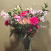 A soft and cheerful bouquet featuring beautiful pink blooms arranged in a