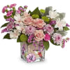 Sweet as a hummingbird flitting through a garden, this pretty pink rose